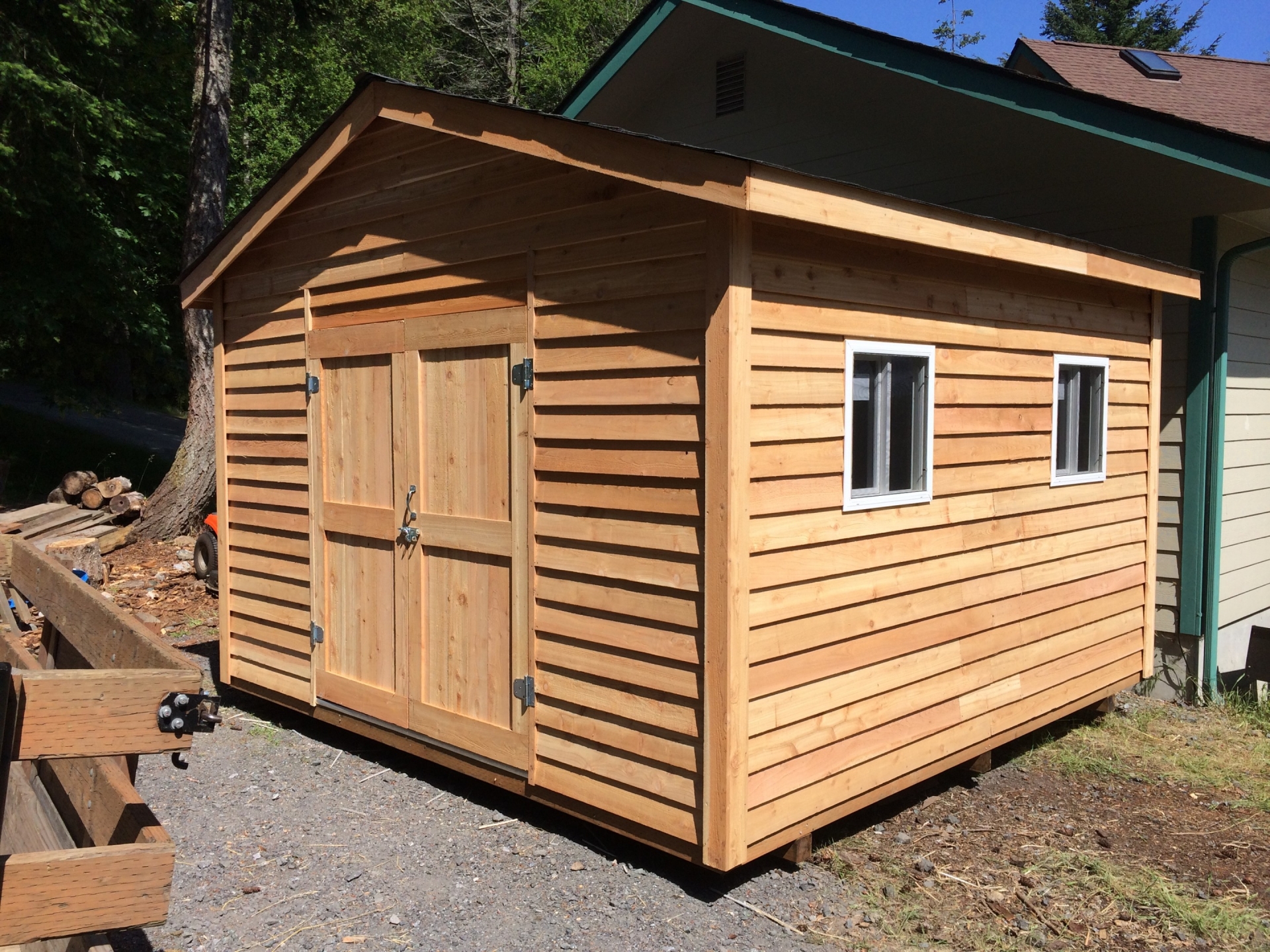 this 12x16 gambrel shed has a nice front porch and huge
